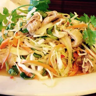 Vietnamese food with a high level of soul, Try Goi Vit as an appetizer, a cold duck salad tossed in a homemade lemon sauce
