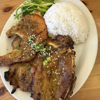 46. Grilled Pork Chop w/Steamed Rice ( Cm Sn Nng )