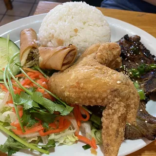 50CB. Rice Combo Pork Chop, Chicken Wing, Fired egg & Egg roll ( Cm Combo )