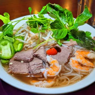 a bowl of vietnamese noodle soup