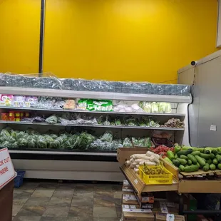 produce and vegetables in display cases