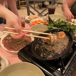 Bo Tom Nuong Vi - marinated beef and shrimp in lemon grass