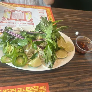 Very generous toppings provided for two bowls pho