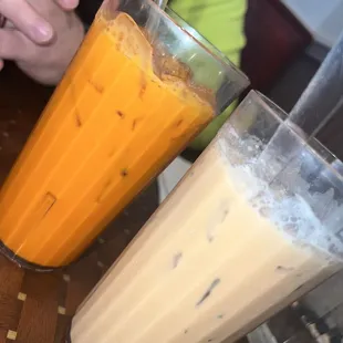 two glasses of iced coffee on a table