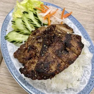 Grilled pork chop and rice plate