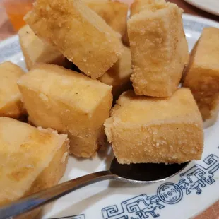 a plate of fried tofu