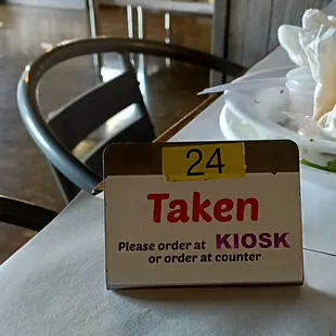 a taken order sign on a table