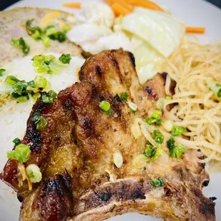 Cơm Sườn Nướng. Grilled pork chops platter.