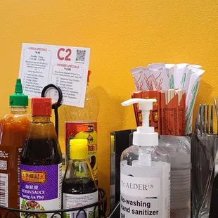 a counter with a variety of condiments