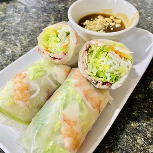 three rolls of food on a plate