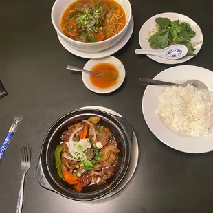 Pork clay pot (bottom) and Pho (top)