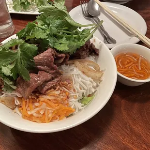 Vermicelli bowl with beef... and cooked onions? Not the typical vermicelli bowl you'd get at a Vietnamese restaurant