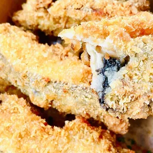 Portobello Tenders - yum, super crunchy, vegan.  There is chili powder sprinkled on top. :)