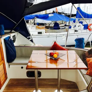 Teak table open in guest cockpit