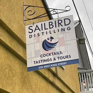 a sign on the side of a building