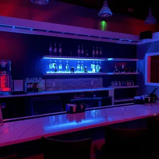 a bar with neon lights