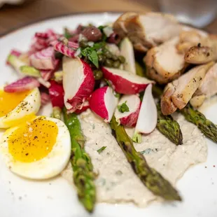 Roasted Asparagus and Radish Salad w/ added chicken breast  ($18 + $5/chicken) tonnato sauce, niçoise olives, soft boiled egg
