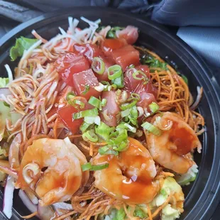 Sushi rice and salad Shrimp and Tuna Seaweed salad, crab meat, avocado, green onions, carrots and corn. Ponzu and poke sauce Delicious