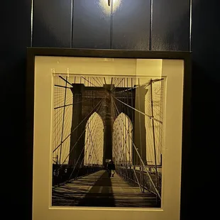 a picture of the brooklyn bridge at night