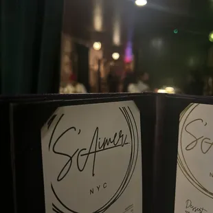 two menus on a table