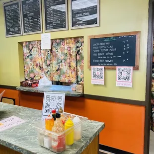 a restaurant counter and menus