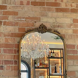 a reflection of a chandelier