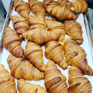 a tray of croissants