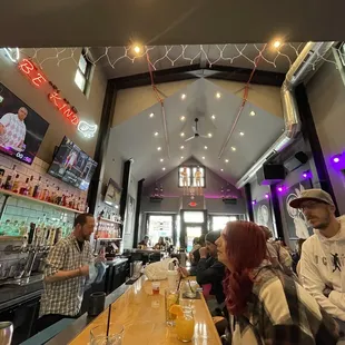 people sitting at a bar