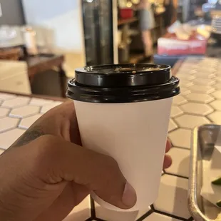 Coffee and breakfast sandwich