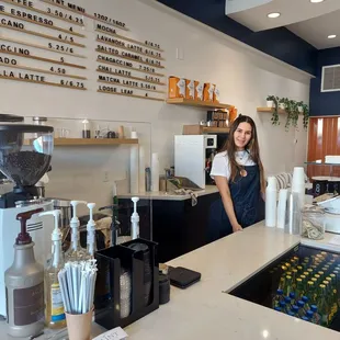 a woman behind the counter