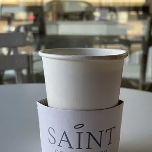a cup of coffee on a table