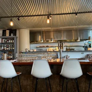 the kitchen and bar of a restaurant