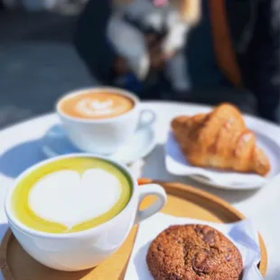 Matcha Latte ($6+$1.25 oat milk), Mocha ($6.25), The Midwife and The Baker Chocolate Chip Cookie + Plain Croissant