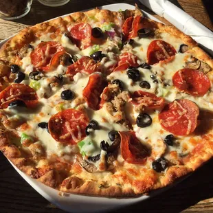 Small supreme pizza was nicely priced and perfect for two people (or one very hungry person)