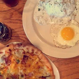 Half order biscuits and gravy with a sunny side up egg and a small breakfast pizza