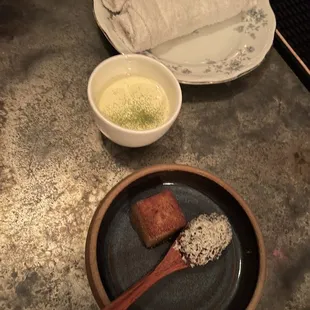 a plate of food and a bowl of soup