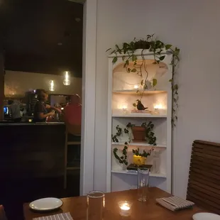 a dining room with a table and chairs