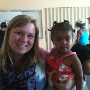 Megan with one of the SJS children