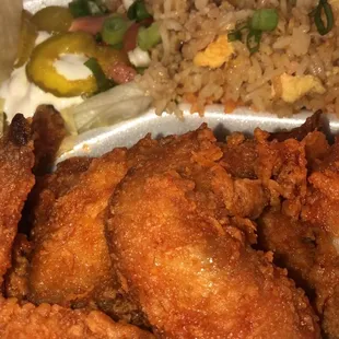 10 piece buffalo chicken plate with shrimp fried rice and side salad .