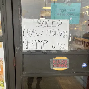 a sign on the door of a burger king restaurant
