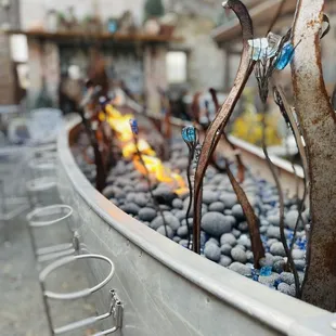 Exterior canoe fire pit