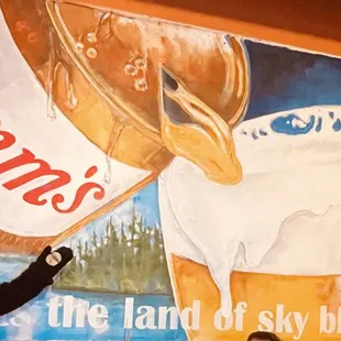 The Bear enjoy's the hand-painted mural