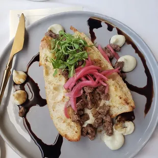 Wet aged beef bruschetta