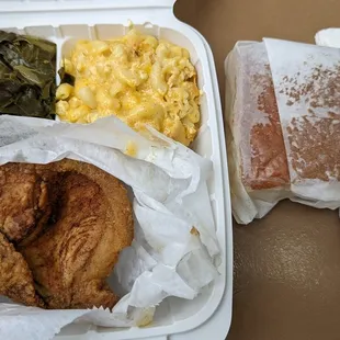 Pork chop with collard greens, mac &amp; cheese, and cornbread