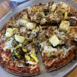 Cauliflower crust is the move at Saints, crispy just like it should be!