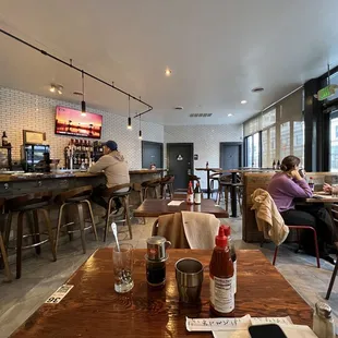 customers sitting at the bar