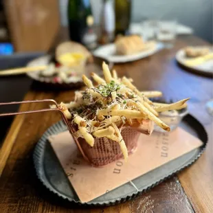 Truffle Fries, white truffle aioli, summer black truffles, parmesan