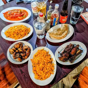 All of the food! Seasoned rice, ribs, plantains, stewed fish, and beef empanada. So freaking good!