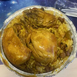 Stewed chicken lunch special with white rice and beans