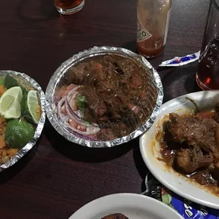 Oxtail, beef stew and rice and peas.
